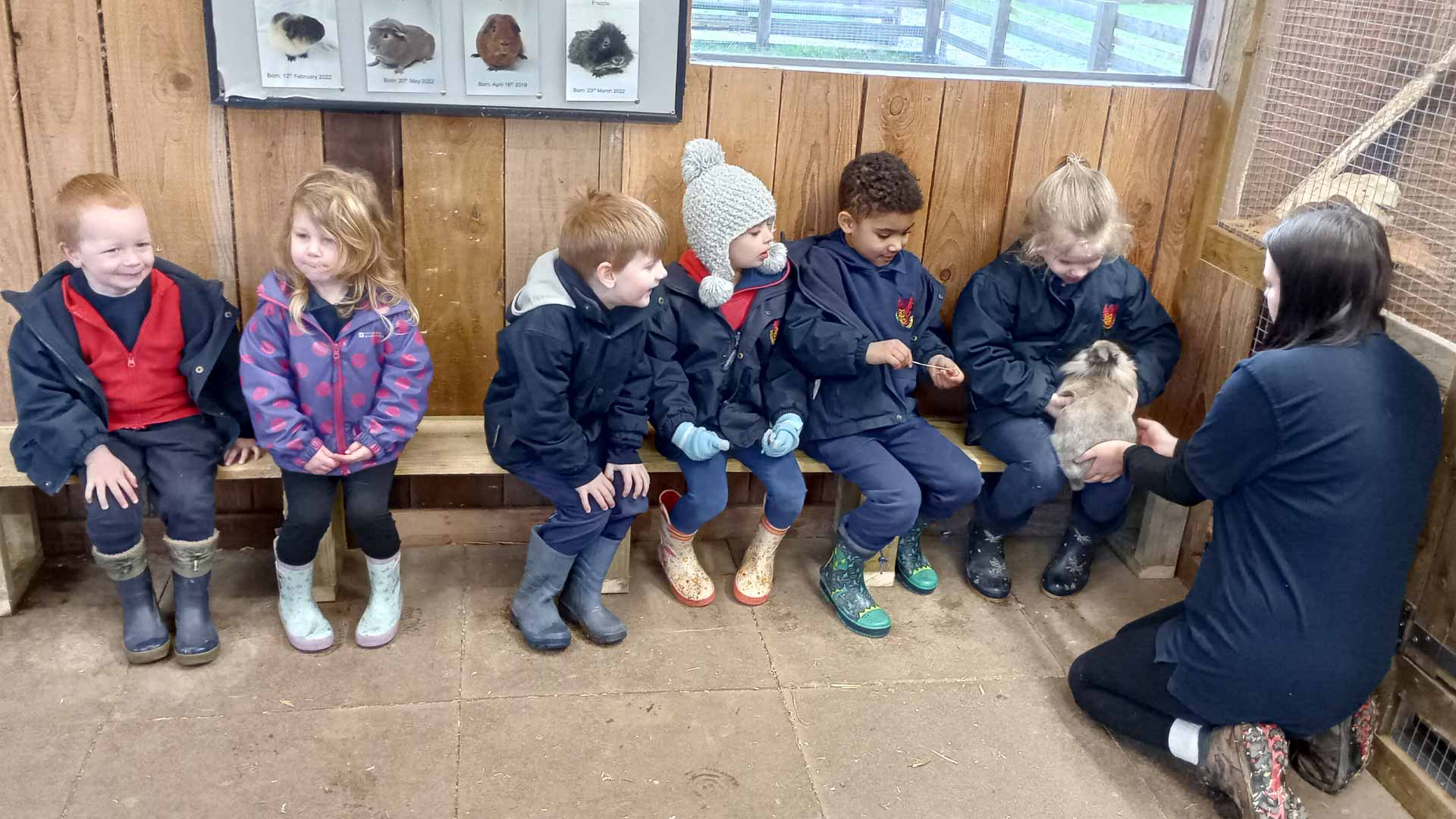 Early Years children in wellies at forest school