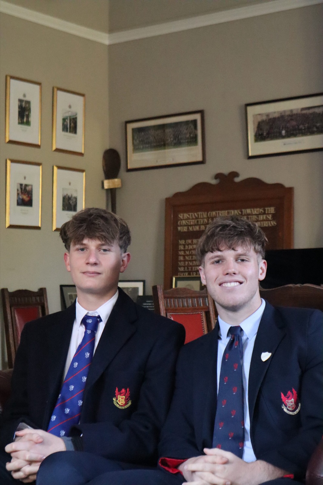Two sixth formers in the Warden's study